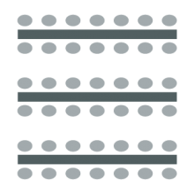 Three rows of tables with seating on both sides. 